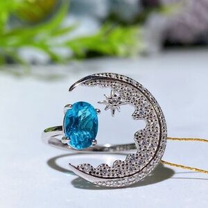 Silver Moon and Blue Topaz Gemstone Ring